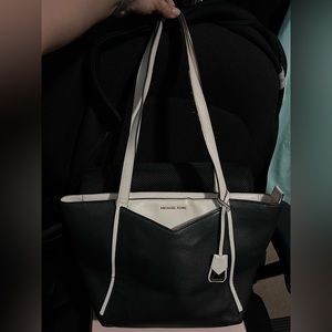 Michael Kors purse medium size color black and white.